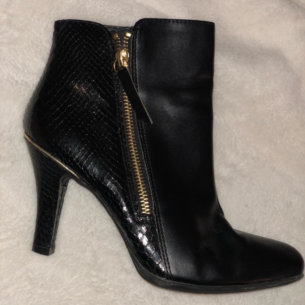 Classic black booties with gold detailing